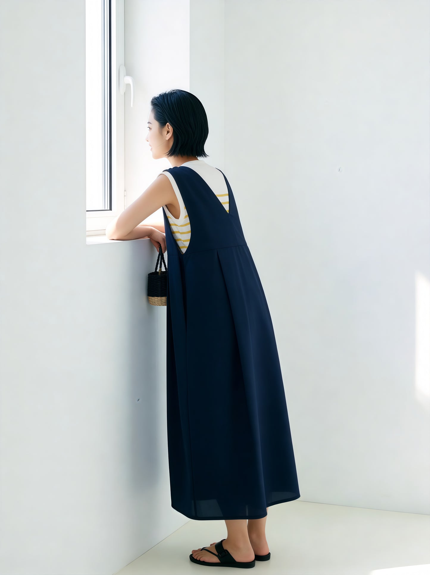 KNSO370 - A jumper skirt that can be worn with a T-shirt or knitwear, perfect all year round. Linen blend dress.