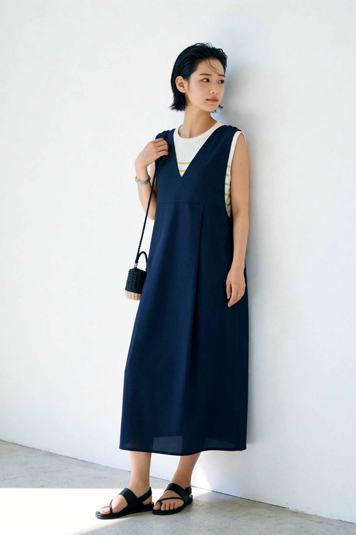 KNSO370 - A jumper skirt that can be worn with a T-shirt or knitwear, perfect all year round. Linen blend dress.