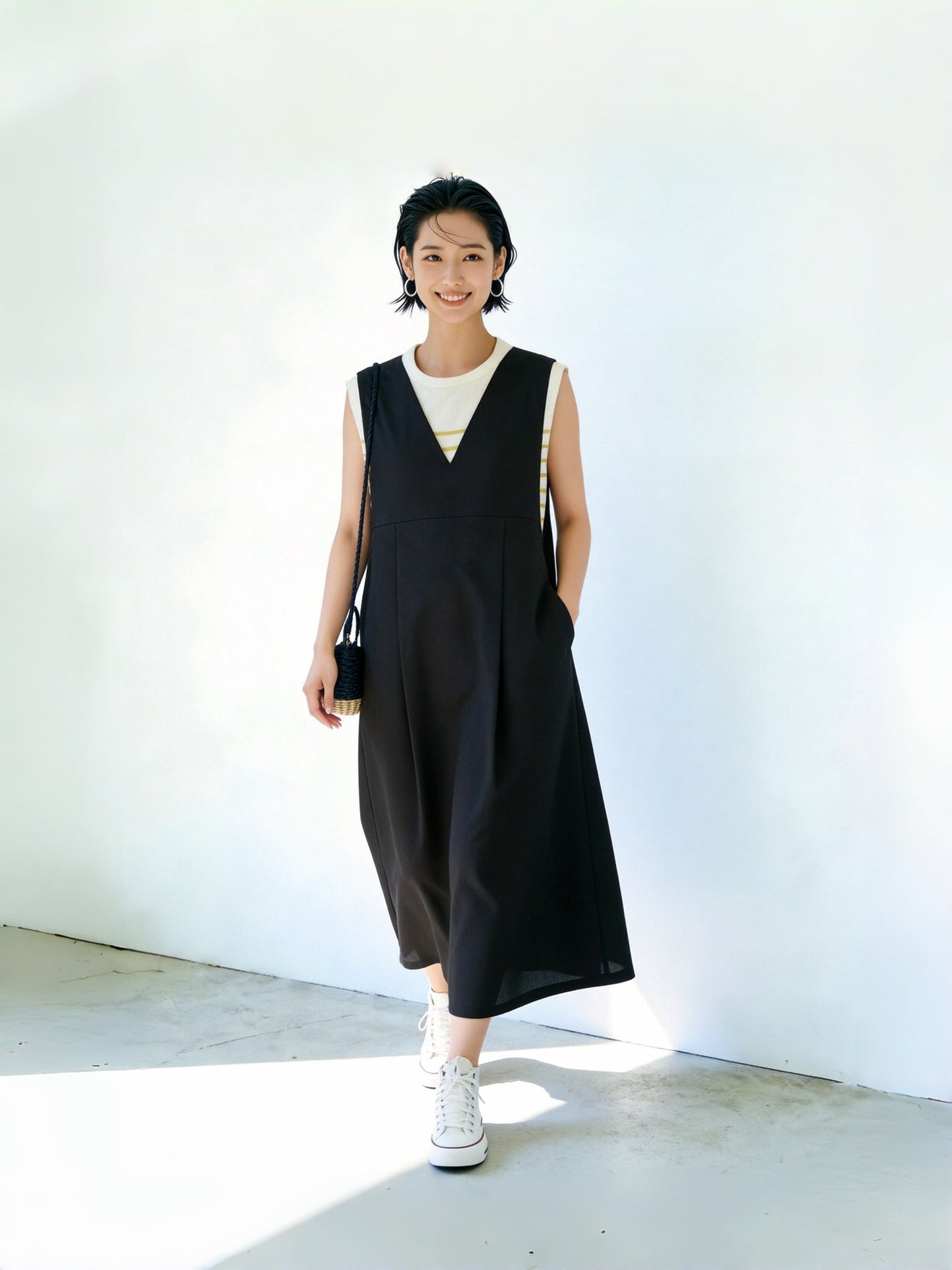 KNSO370 - A jumper skirt that can be worn with a T-shirt or knitwear, perfect all year round. Linen blend dress.